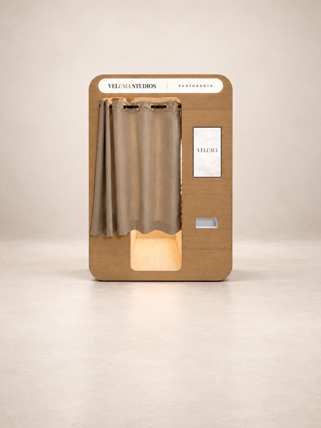 The Veluma enclosed photo booth in light oak with a curtained entry